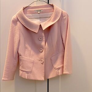 Pink Holt Renfrew cropped jacket.